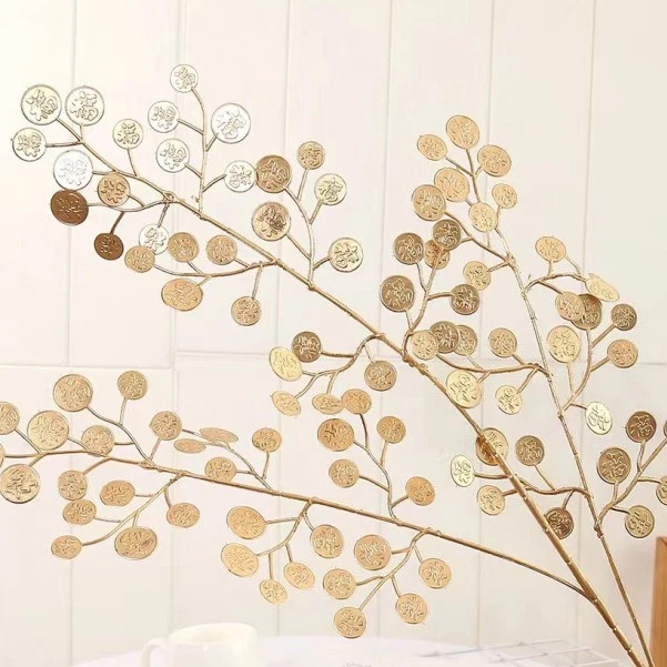 Dekoratives Goldenes Münz-Zweig Arrangement