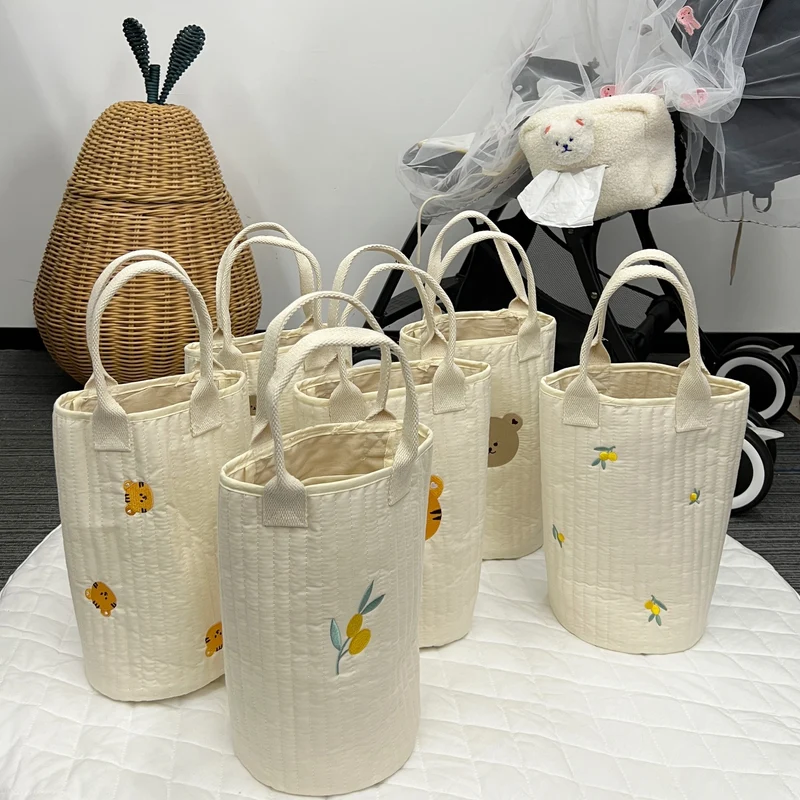 Ge quiltete Baumwoll-Canvas-Tasche mit besticktem Zitronenmuster und kurzen Webbandgriffen