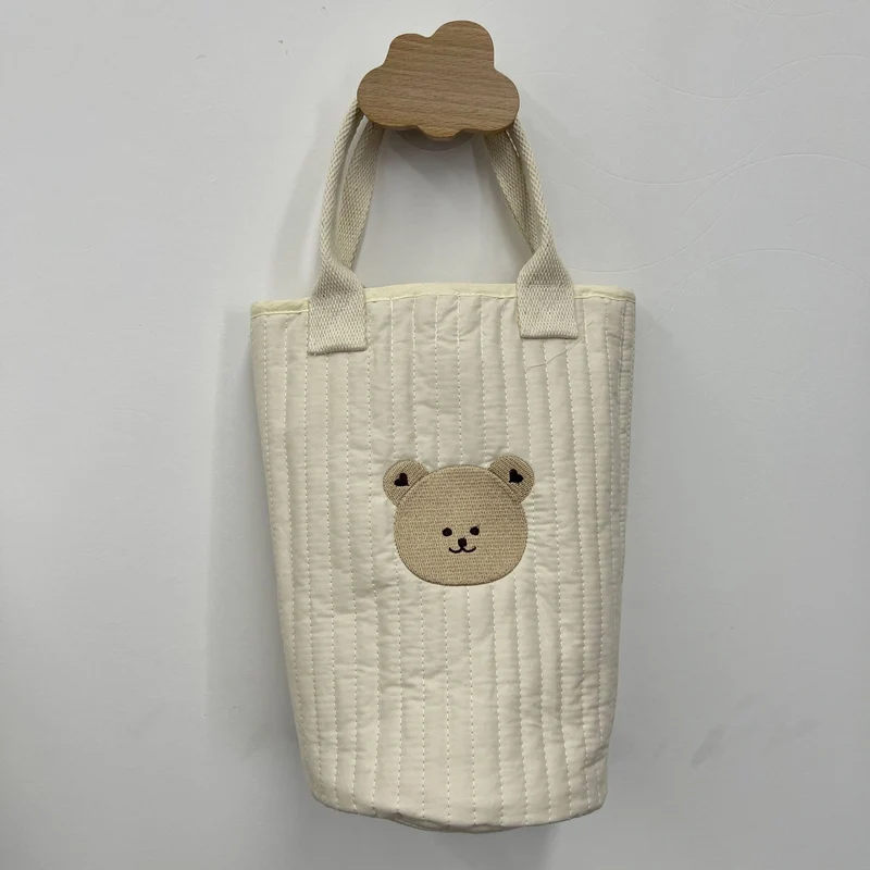 Ge quiltete Baumwoll-Canvas-Tasche mit besticktem Zitronenmuster und kurzen Webbandgriffen