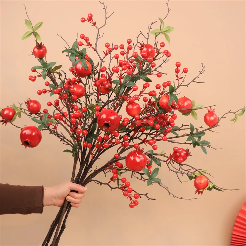 Dekorative Granatapfelblütenarrangement