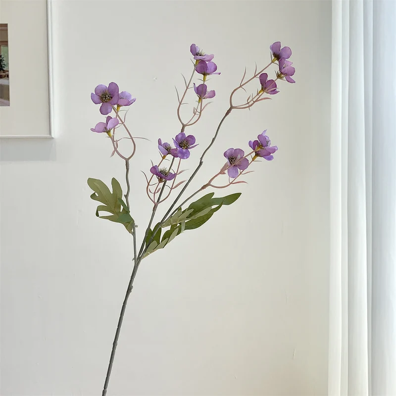 Dekorativer künstlicher Blumenzweig