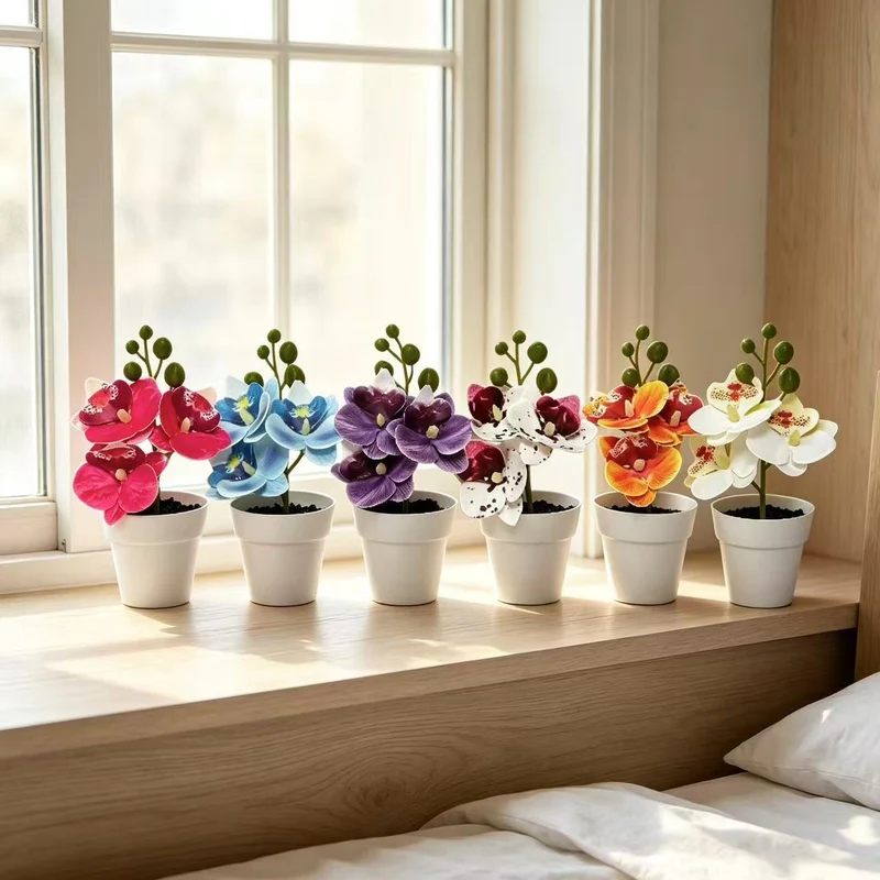 Lebensechte florale Orchideenarrangement für die Wohnkultur