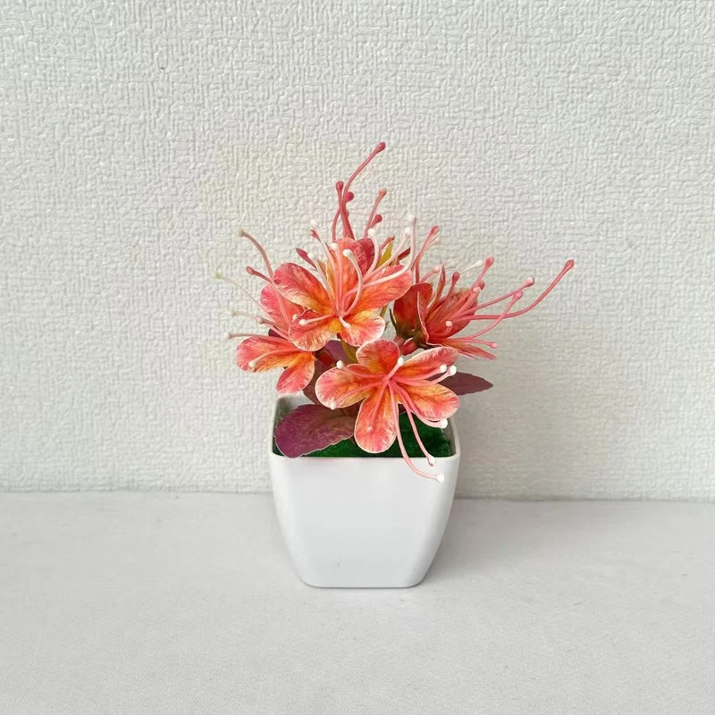 Lebensechte florale Tischmitte für die innere Wohnkultur