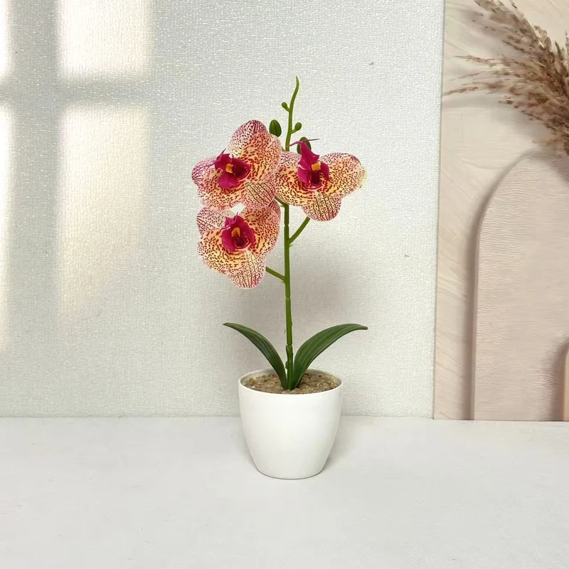 Realistische künstliche Orchideenpflanze für die Wohnkultur-Darstellung