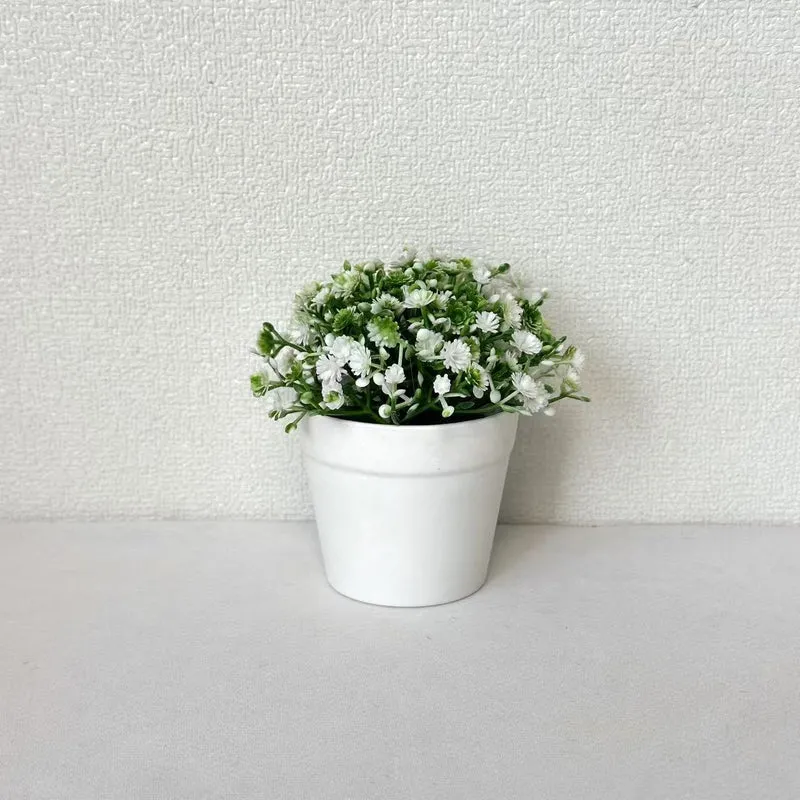 Miniatur Arrangement mit künstlichen Blumen im Topf