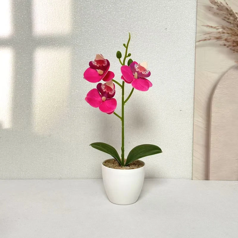 Elegante Kunst-Orchideen-Pflanzenschmuck