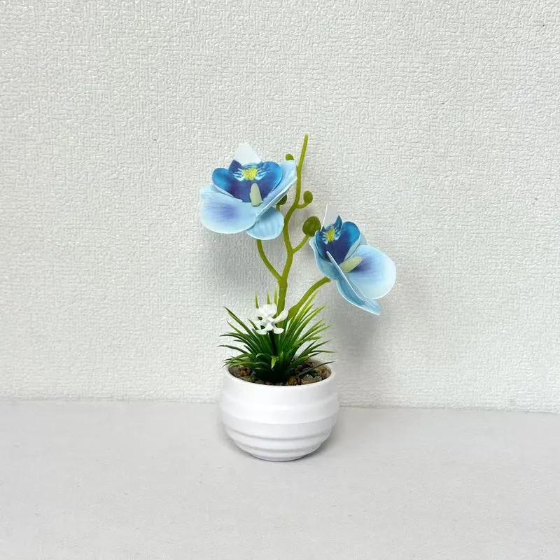 Dekorative Miniaturorchideen-Tischdekoration