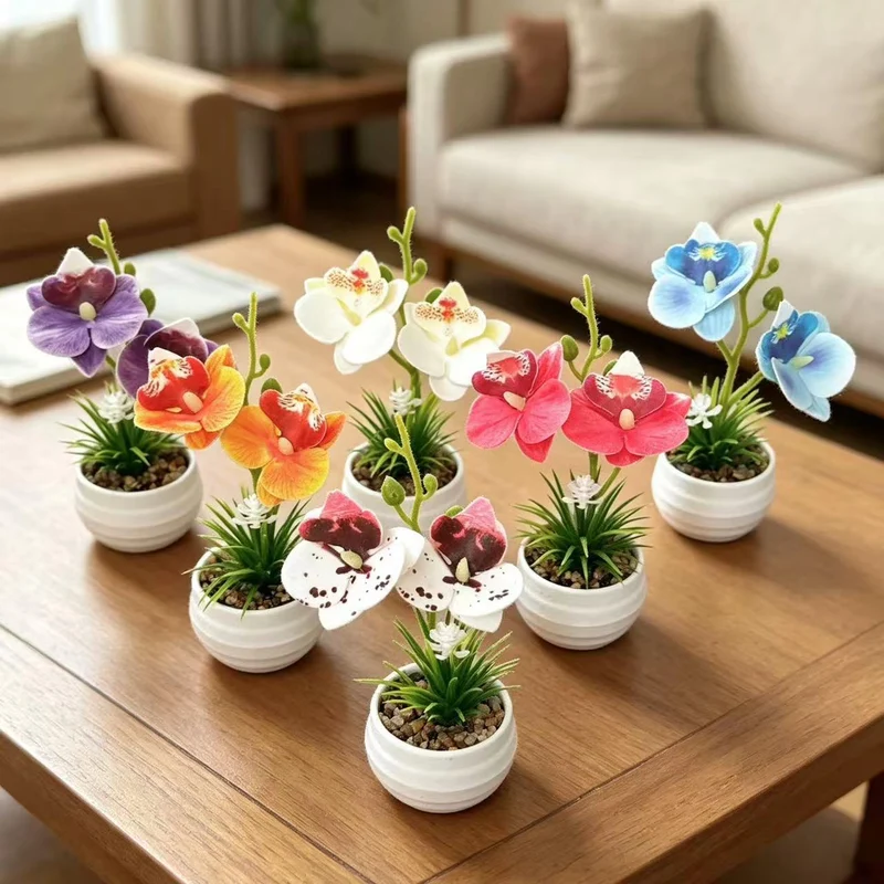 Dekorative Miniaturorchideen-Tischdekoration