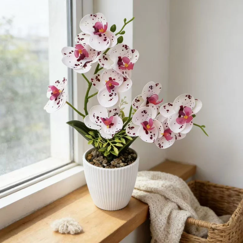 Künstliche Orchidee für Wohnkultur und Innendekoration