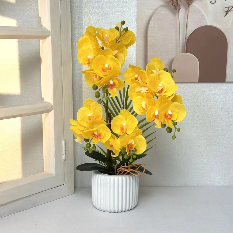 Künstliche Orchideenarrangement für dekorative Wohnbebilderung