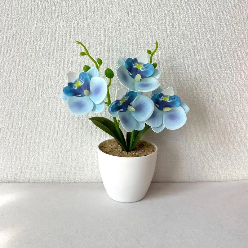 Elegante synthetische Orchideenarrangement
