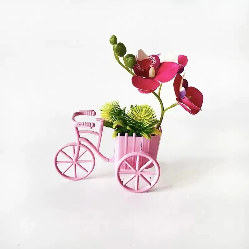Dekorativer Fahrrad-Blumentopf mit Kunstorchideen-Arrangements für Dekor