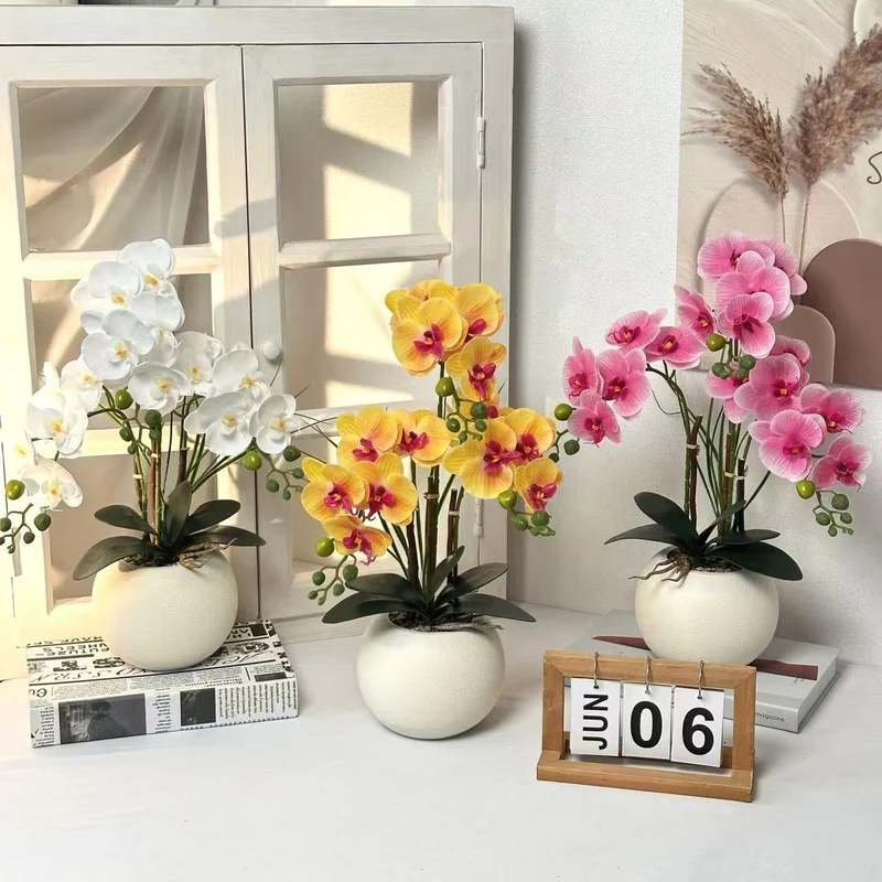 Elegante künstliche Orchideenpflanzenarrangement für die Wohnkultur