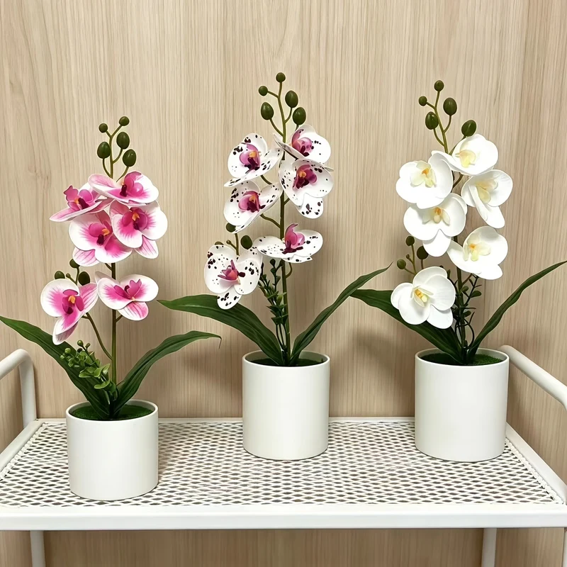 Elegante künstliche Orchideenpflanzenanordnung für die Innenausstellung