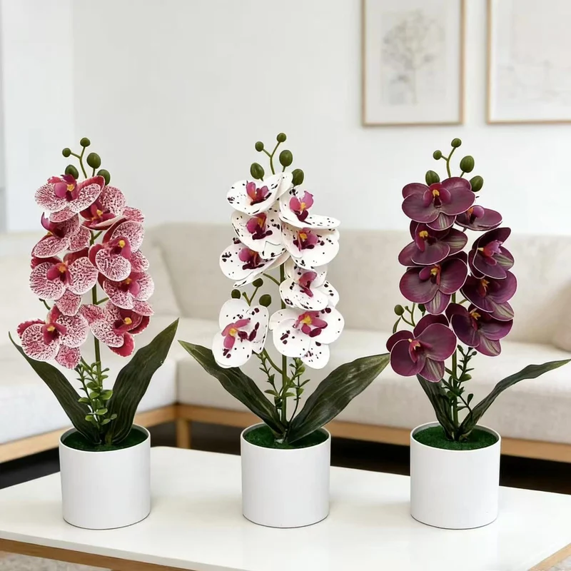 Dekorative künstliche Orchideenarrangement für Tischdeko