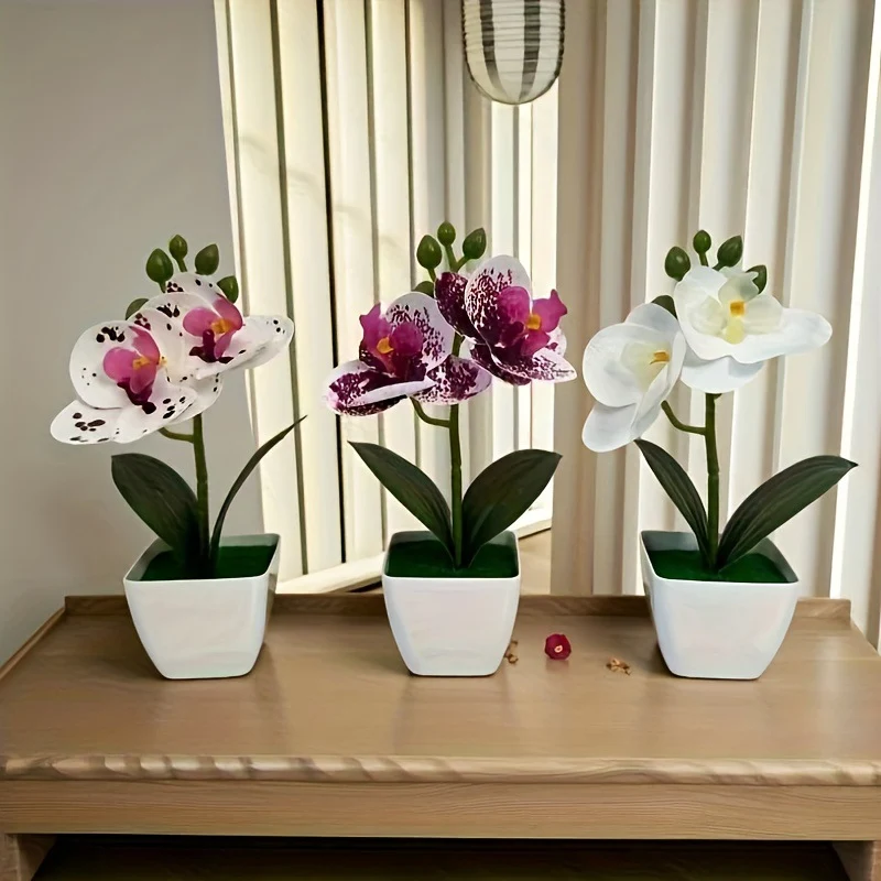 Dekorative künstliche Orchideenarrangement für die Wohnkultur展示
