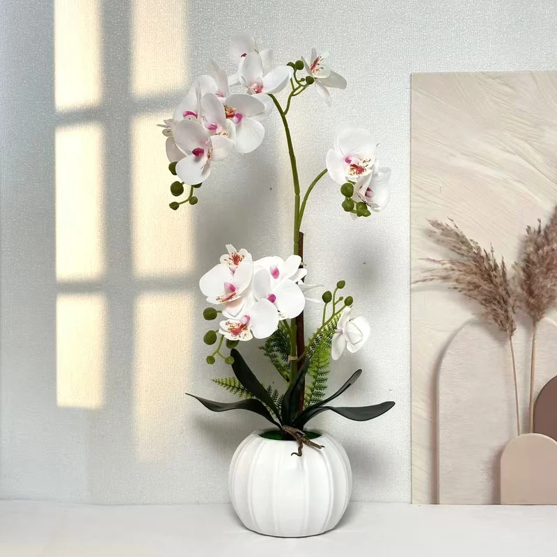 Elegante künstliche Orchideenarrangement für die Innenraumdekoration
