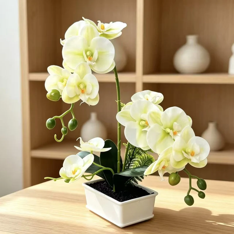 Elegante künstliche Orchideenarrangement für die Innendekoration