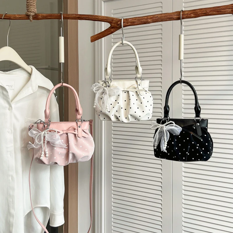 Stylische Pünktchen-Handtasche