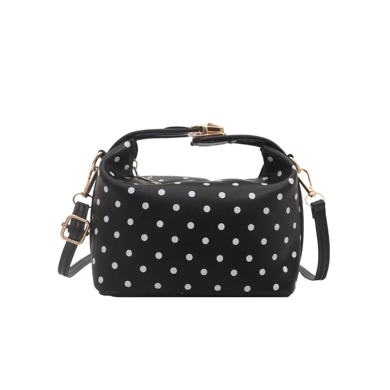 Stylische gepunktete Umhängetasche