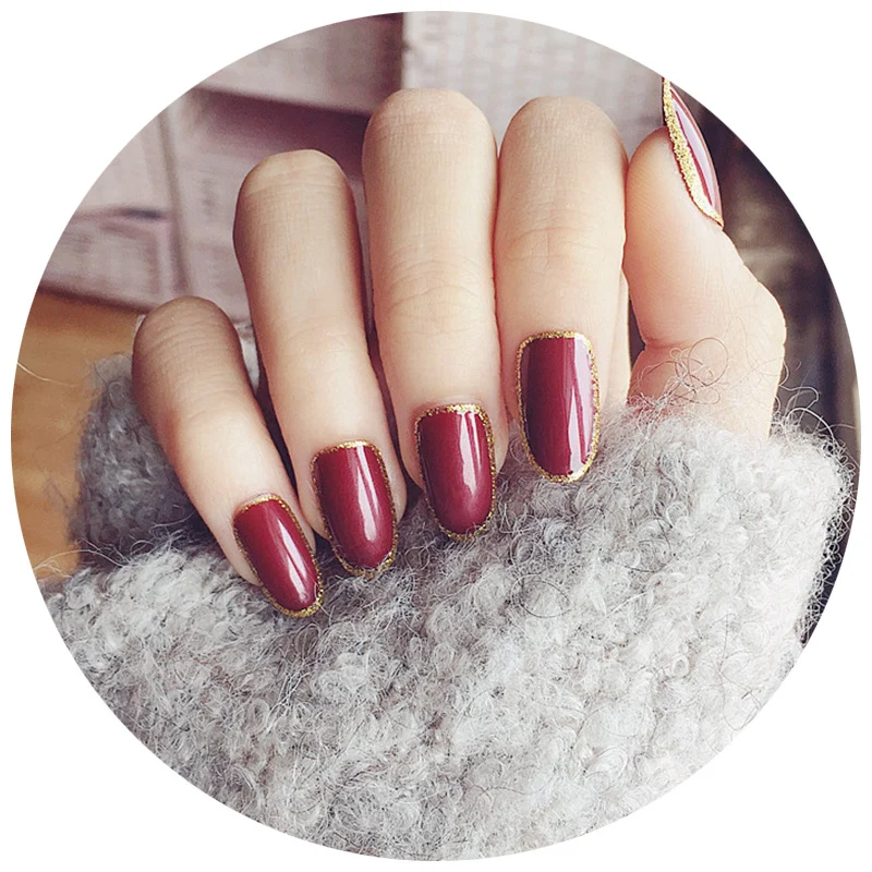 Elegante Glänzende Press-On Nägel mit Goldrand