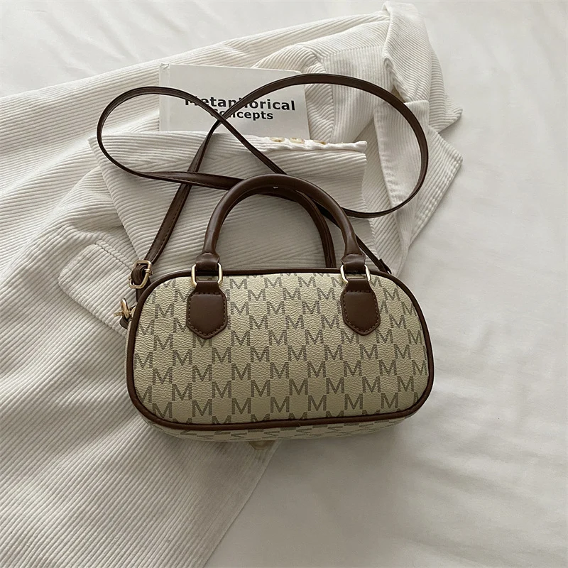 Stylische Monogram-Handtasche