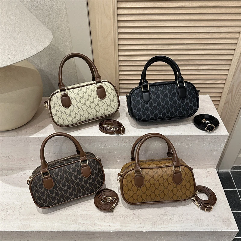 Stylische Monogram-Handtasche