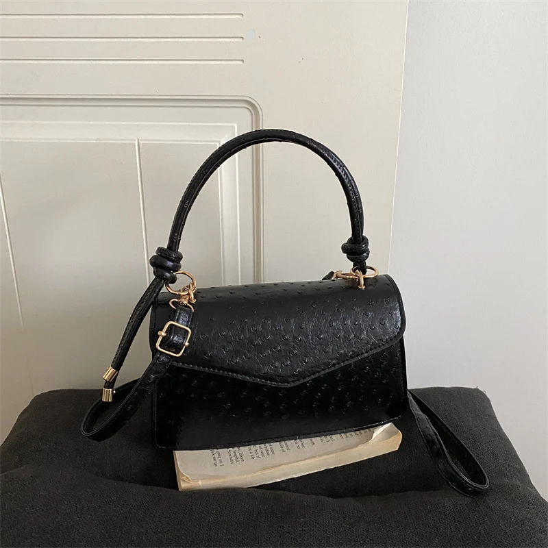 Strukturierte Lederhandtasche