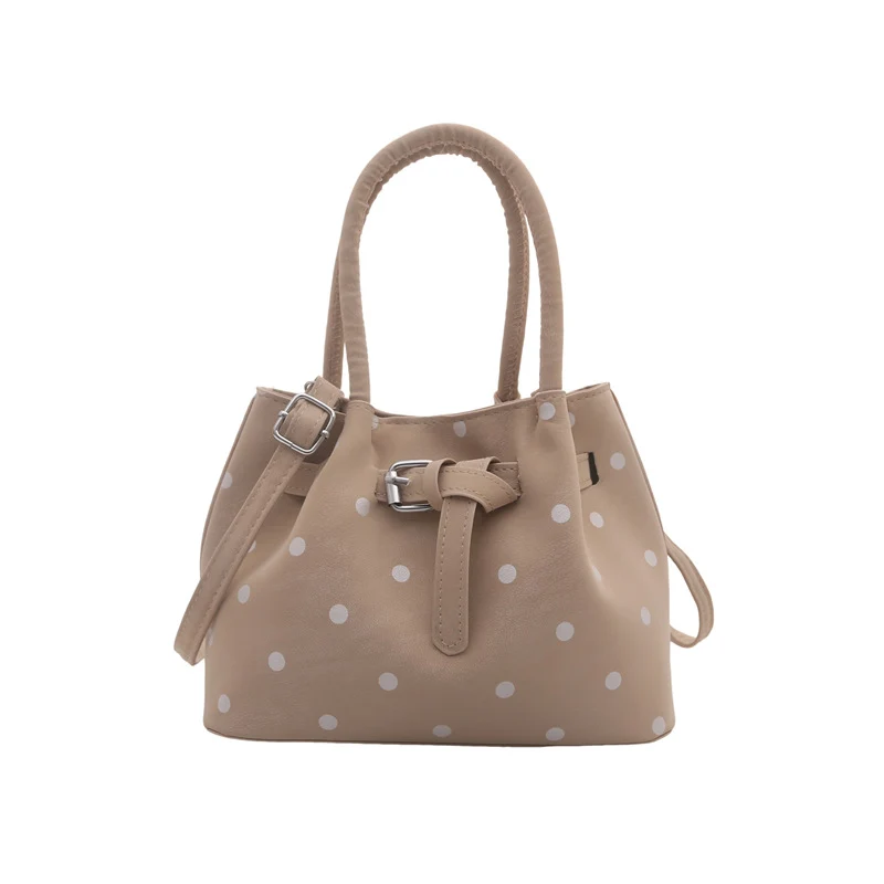 Legere Wildleder-Punktedot-Handtasche