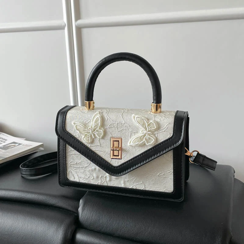 Elegante bestickte Handtasche