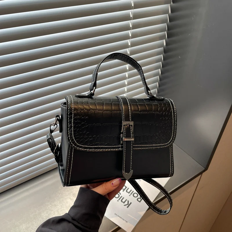 Elegante Krokodilmuster-Handtasche