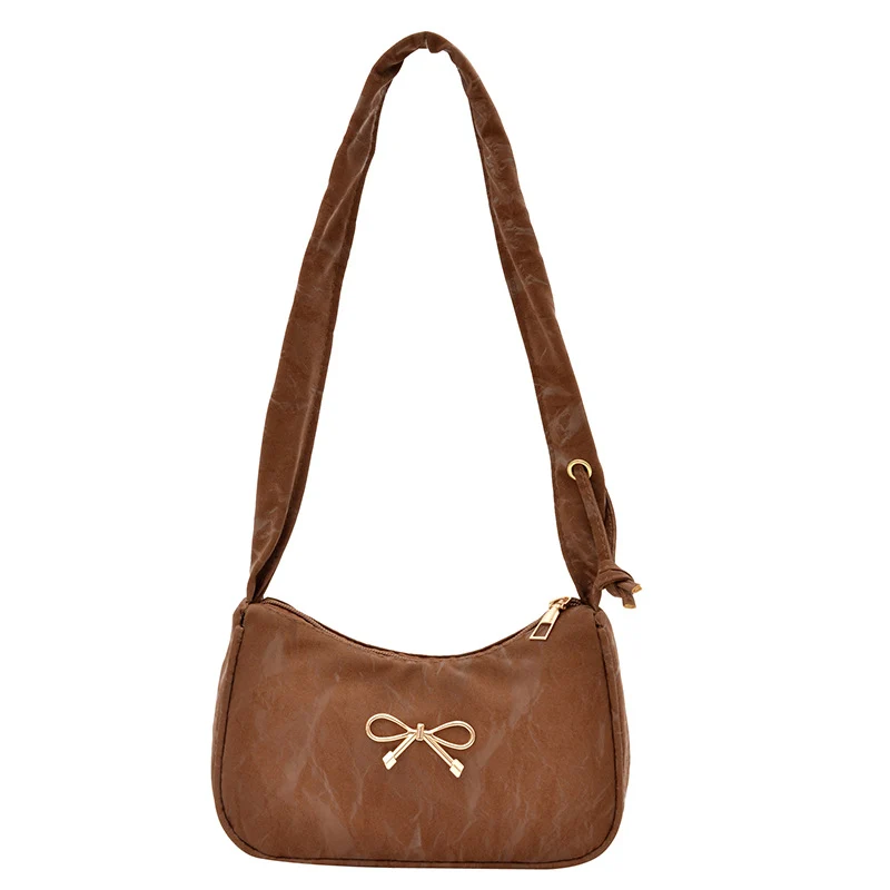 Elegante Schultertasche mit Schleifenverzierung