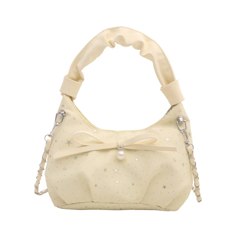 Elegante Handtasche mit Schleifendetail und Sternenprint