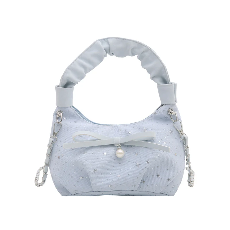 Elegante Handtasche mit Schleifendetail und Sternenprint