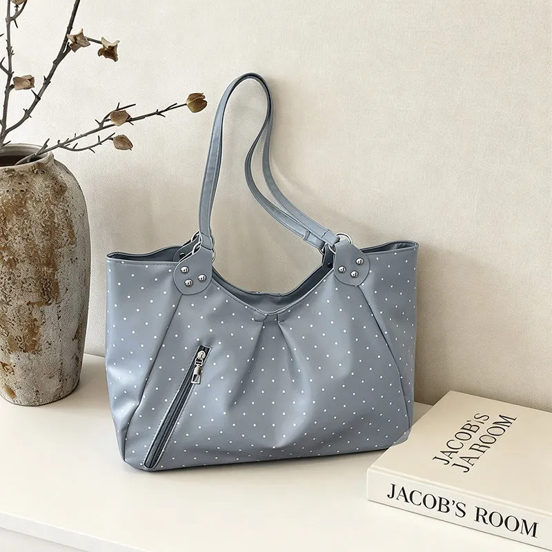 Stilvolle gepunktete Sling Bag