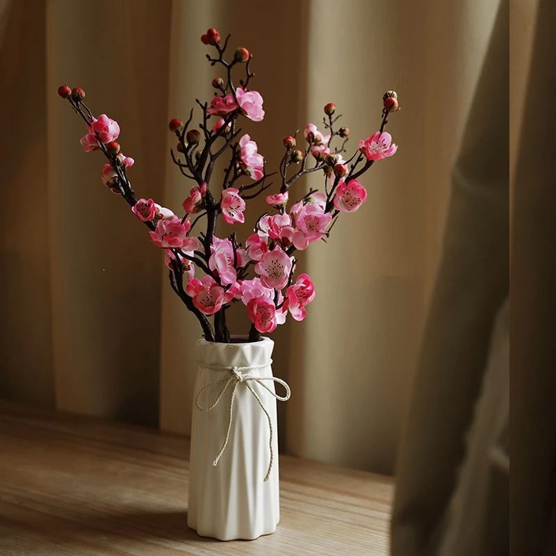 Dekorative Blumenäste Arrangement