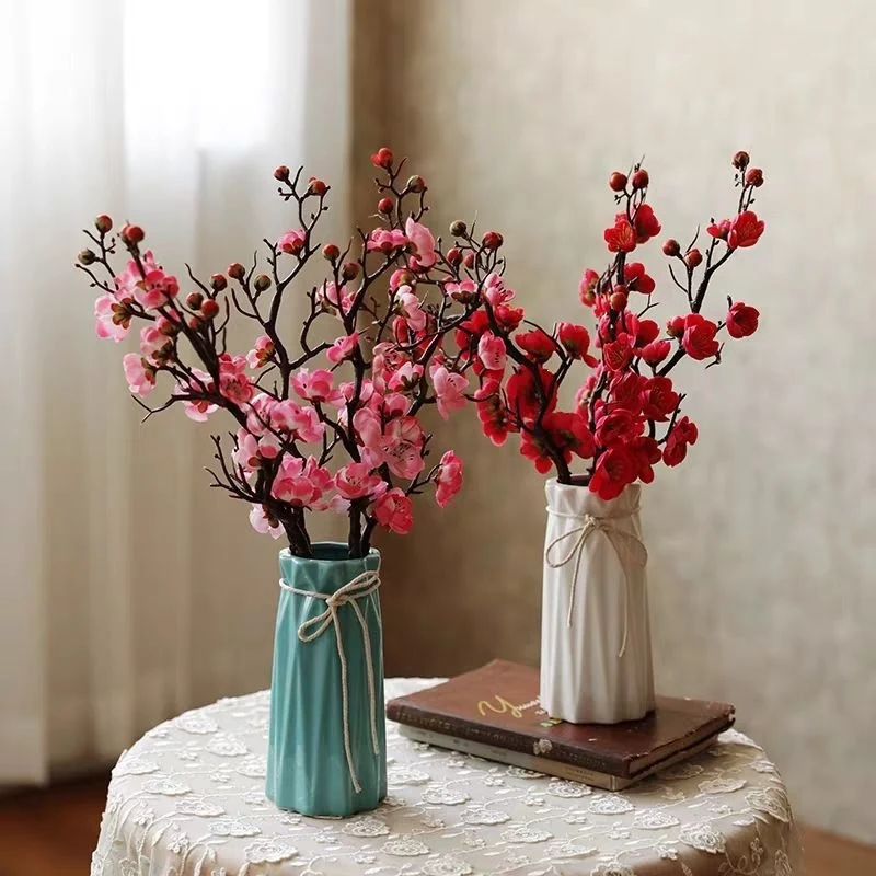 Dekorative Blumenäste Arrangement