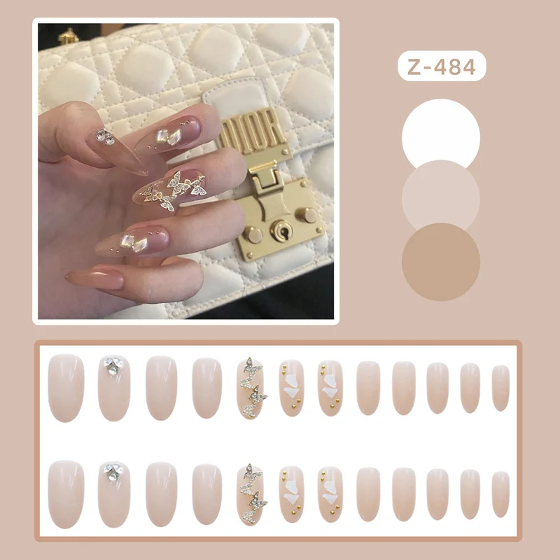 Luxuriöse dekorative Press-On Nagelkunst mit Edelsteindetails Karnz