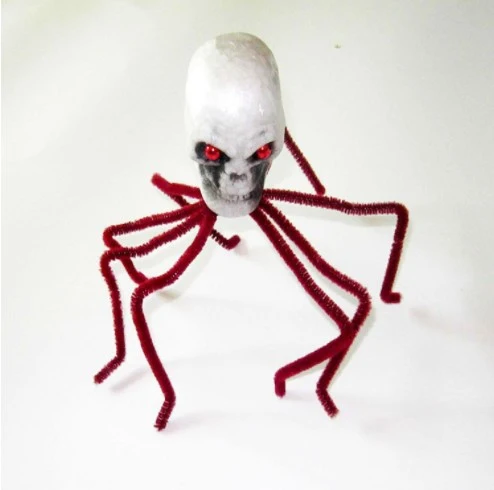 Dekorative Schädel-Spinnenfigur Karnz