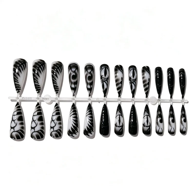 Künstlerisches Stiletto Press-On Nagelset Karnz