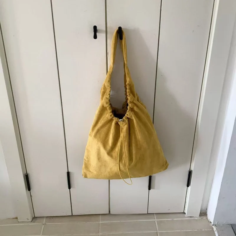 Legere Kordelzug Schultertasche
