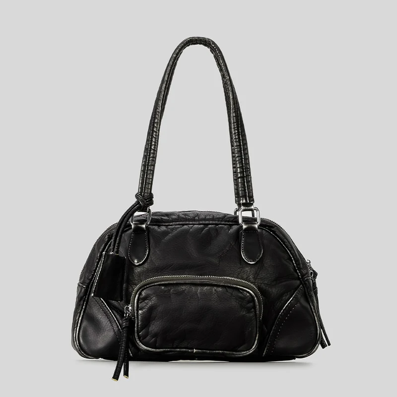 Multifunktionale Stepphandtasche