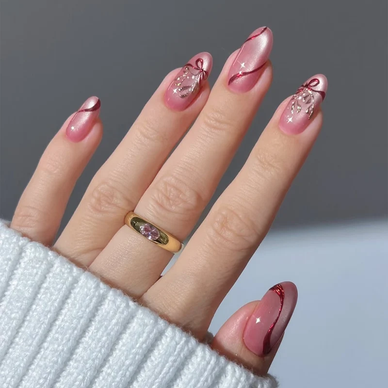 Elegante mit Schleifen verzierten Press-On Nagelkunst Karnz