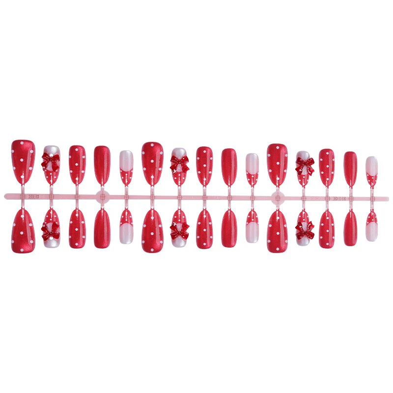 Charmantes dekoratives Press-On Nagelkunstset mit Schleifen- und Punkten-Design Karnz