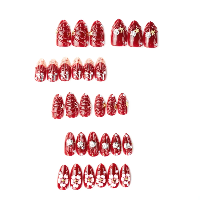 Künstlerisches Press-On Nagelkunst Set mit floralen und Muschel-Designs Karnz