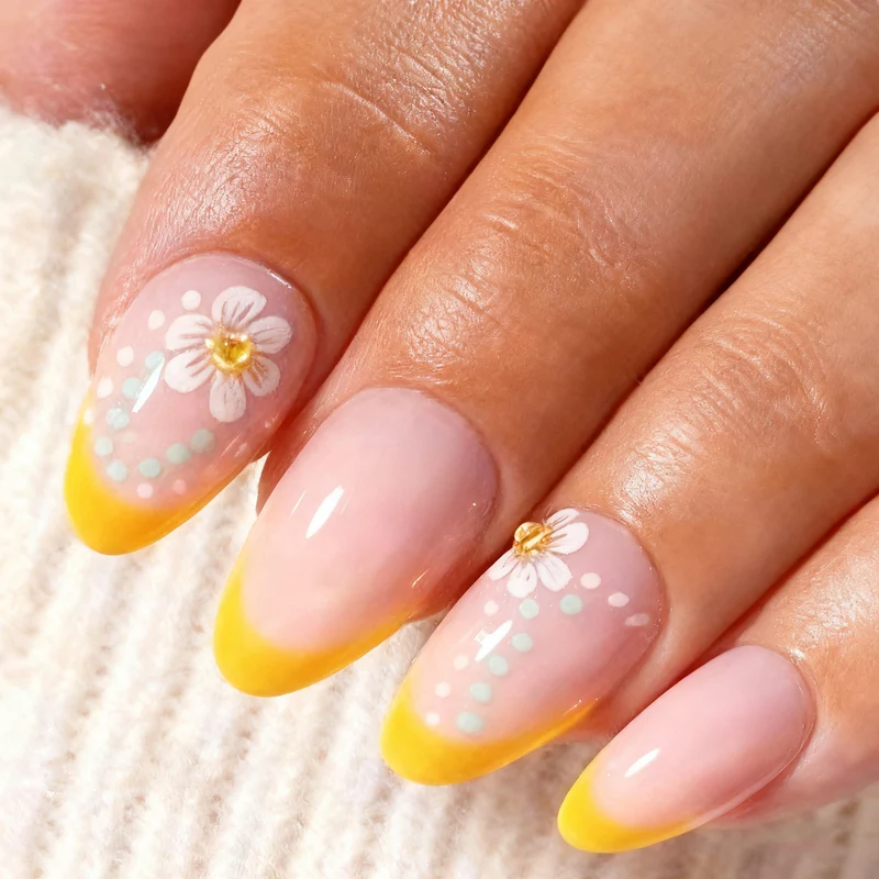 Künstlerisches, mit Blumen verziertes Press-On Nagelset Karnz