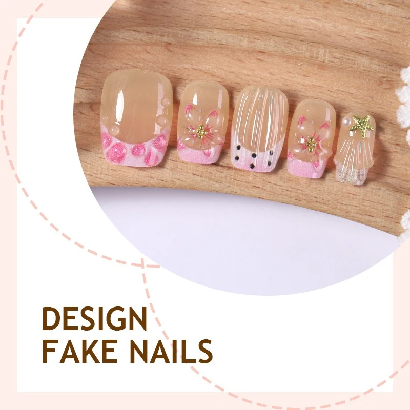 Kunstnagelset mit floralen Designs und eleganten Glitzerelementen Karnz
