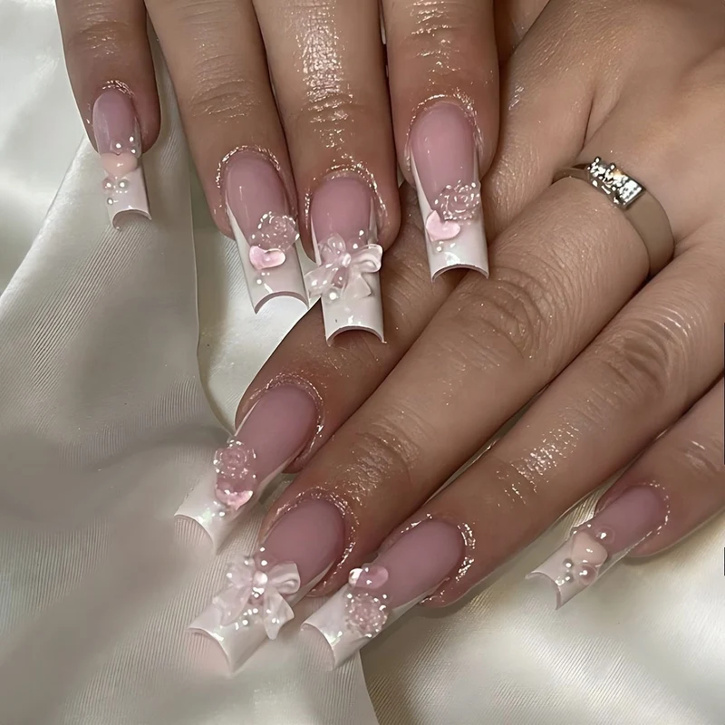 Kunstnagelset mit Glamourösen Perlen- und Glitzerelementen Karnz
