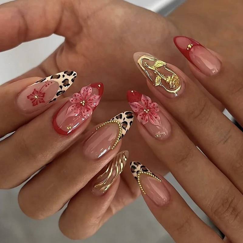Kunstnagelset mit glamourösen Blüten- und Glitzerelementen Karnz