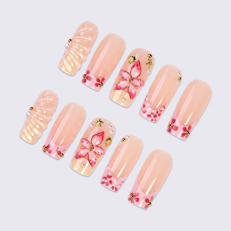 Kunstnagelset mit floralen 3D-Motiven und Glitzerakzenten Karnz